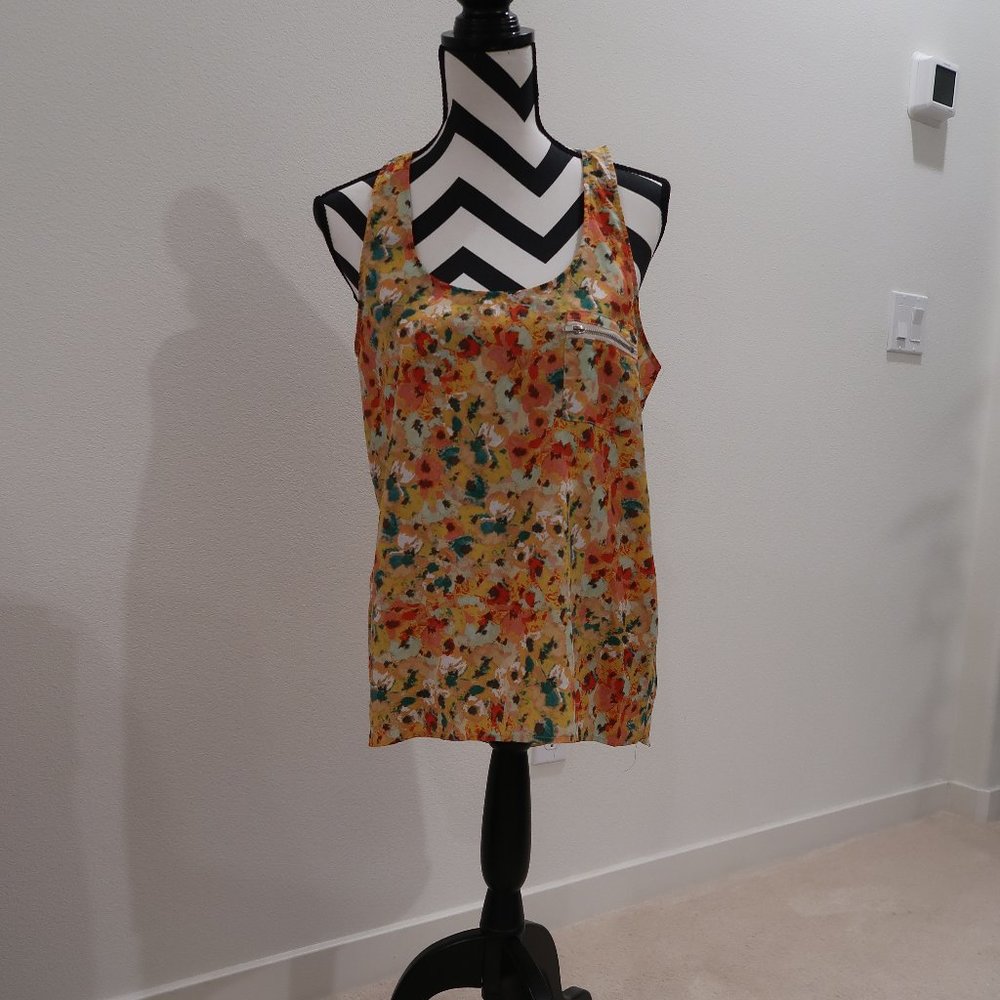 Floral Sleeveless Top with Long Back Hem